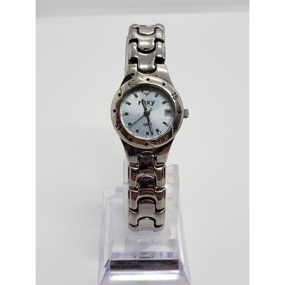 Roxy women's watch. Blue iridescent face. Calendar on watch face. working watch - Picture 2 of 7